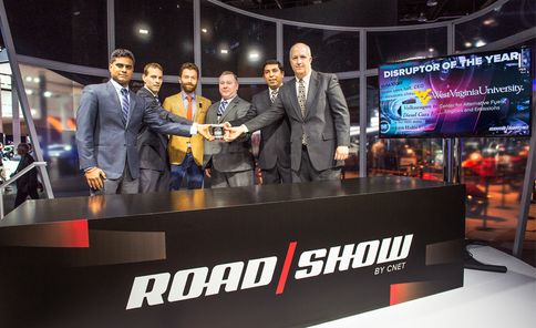 The CAFEE team receiving an award on the Road Show